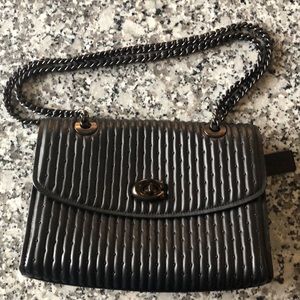 Coach Parker with Rivets